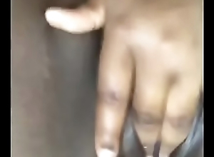 Ebony knuckles gaping void into her pussy